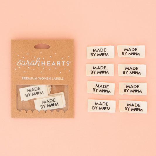 Organic cotton woven labels set with 'Made by Mom' white tags