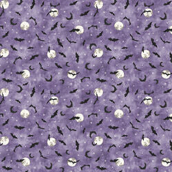 Lilac fabric with scattered bat silhouettes and small moon/star motifs, sold by the half yard