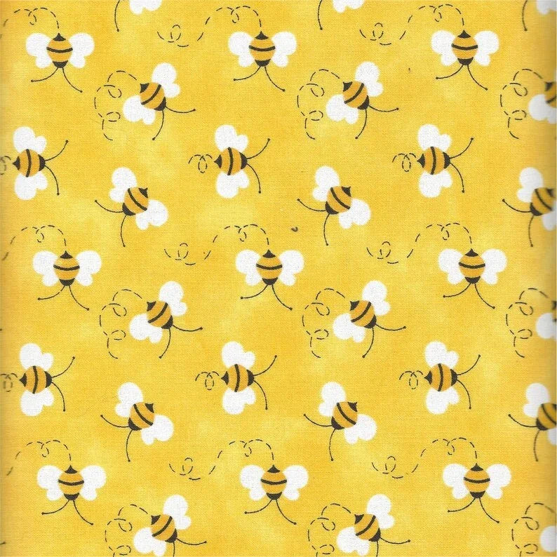 Bees pattern fabric: yellow with white and black striped bee motifs