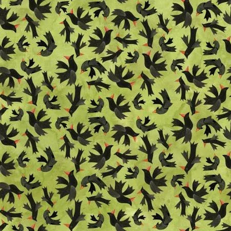 Green fabric with black whimsical bird silhouettes for Halloween quilting and crafts